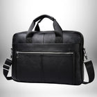 Un sac de bureau noir en cuir avec une poignée supérieure, une bandoulière et une fermeture à glissière sur le devant.
— vue 7