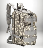 Un sac à dos camouflage gris et blanc avec de nombreuses poches, poignées et sangles réglables. Bien qu'il ne soit pas spécifiquement conçu pour le soin infirmier, il pourrait potentiellement être utilisé comme sac infirmier en raison de ses nombreux compartiments et sangles. — vue 6