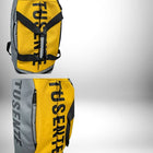 Image d'un sac à dos de foot avec compartiment chaussure, de couleur jaune et grise. — vue 4