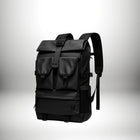 Un sac a dos utilitaire noir, avec plusieurs poches et un rabat. — vue 8