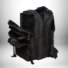 Un sac à dos noir pour le camping avec plusieurs compartiments et sangles.
— vue 4
