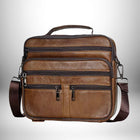 Sac bandoulière homme cuir souple de couleur marron, avec plusieurs compartiments zippés. — vue 8