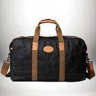 Un grand bagage a main 56x45x25 noir, avec poignées et bandoulière en cuir marron. — vue 5