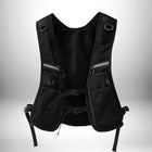 Un gilet noir de sécurité avec des poches et des sangles.
— vue 1
