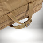 Gros plan sur le manche d'un sac cavaillon beige, révélant une attache en simili cuir avec un bouton-pression métallique. — vue 4