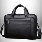 Un sac de bureau noir avec une poignée supérieure, une bandoulière et une poche avant zippée.
 — vue 2
