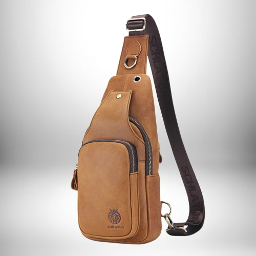 Un petit sac bandoulière cuir, en cuir marron, avec plusieurs compartiments et une bandoulière marquée "SCHLATUM".