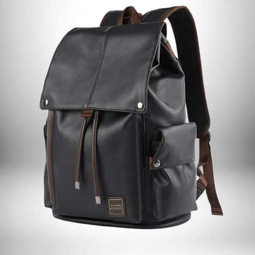 A black backpack with a flap closure, brown accents, and a patch; the backpack features a spacious main compartment, a front pocket, and shoulder straps; this is a stylish and functional backpack
