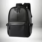 Un sac dos cuir homme noir, élégant et moderne, avec plusieurs compartiments et fermetures éclair. — vue 1