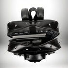 Un sac a dos gothique noir ouvert, avec des rivets métalliques. On peut voir des livres, une tablette et des écouteurs à l'intérieur du sac. — vue 3