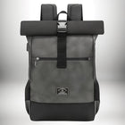 Un sac à dos de couleur gris foncé avec des sangles noires, un fermoir argenté et des bretelles rembourrées. — vue 8
