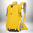 A yellow hiking backpack is shown against a gradient background. The backpack, centered in the image, features a front pocket, side mesh pockets, and adjustable straps.  The word "backpack" is the key term. — vue 5