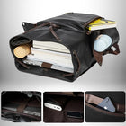 An open black backpack filled with books, a laptop, a water bottle, and other items. The backpack has brown accents and drawstrings. There are also close-up shots highlighting internal pockets and features, including a laptop compartment, and a phone pocket. — vue 4