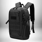 Un sac rando 20l noir, de style tactique, a plusieurs poches et sangles. — vue 8