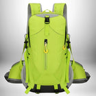 A lime green and dark grey hiking backpack with a yellow zipper, clasps and drawstrings. — vue 4