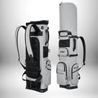 A light grey golf bag, shown from multiple angles. The bag includes multiple pockets, zippers, and a padded black harness; one view shows the bag with a retracted hood. — vue 5
