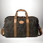 Un grand sac de voyage marron foncé avec des poignées et une bandoulière beige. L'image est centrée sur un grand bagage a main 56x45x25. — vue 3