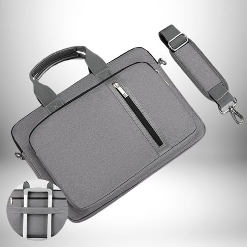 Un objet gris, probable **sacoche ordinateur homme tendance**, repose sur fond blanc avec dégradé. La sacoche est accompagnée d'une bandoulière amovible et d'une petite poche arrondie en bas à gauche.
