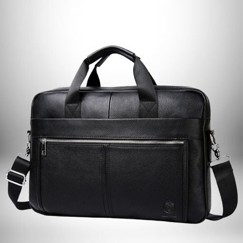 Un sac messager noir en cuir avec des poignées et une bandoulière réglable, sur fond gris avec un effet de lumière.